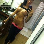 naked selfie tattoo in yoga pants